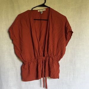 burnt orange open face top
